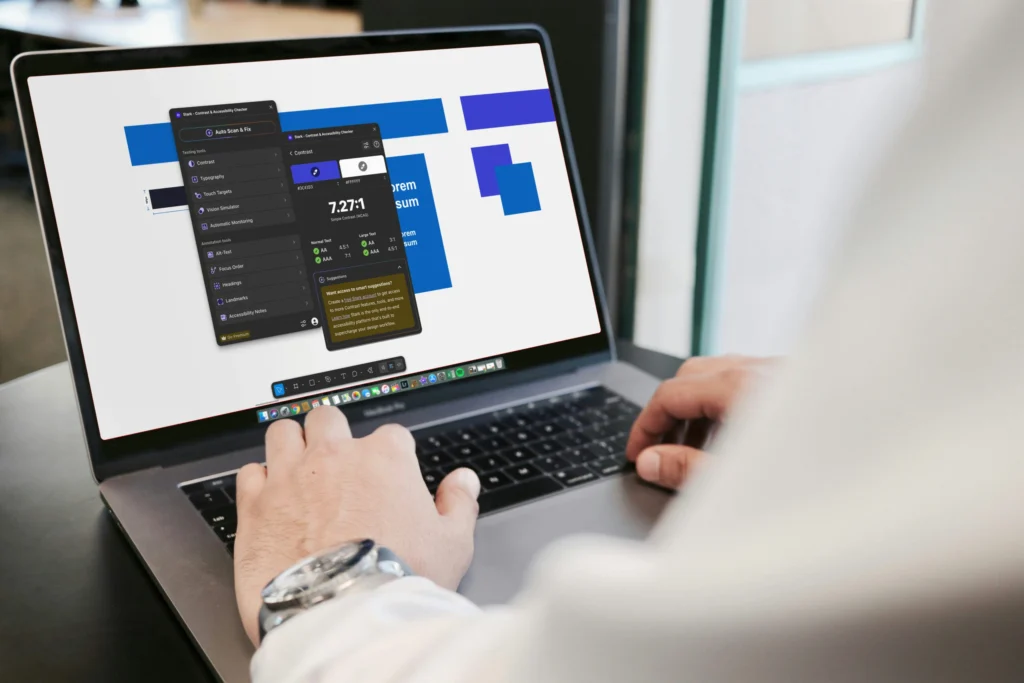 Male hands typing on a laptop with the screen showing a menu dialog