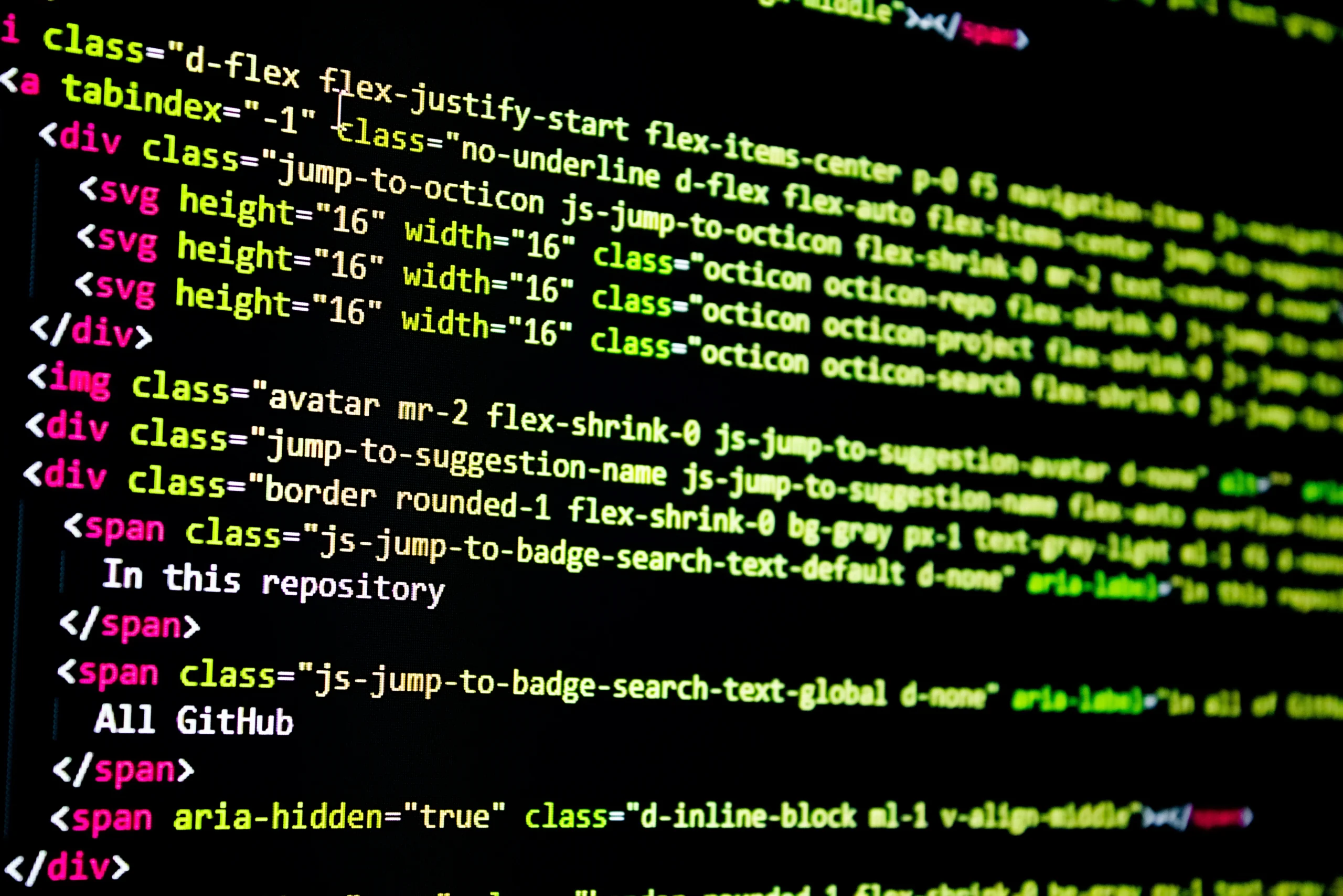 HTML and CSS code displayed on a dark-themed developer screen, featuring class names and accessibility attributes like aria-hidden.